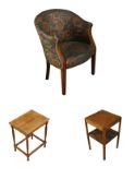 Two mid century oak two tier lamp tables and a mid century tub armchair. H.82cm.