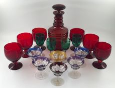 A collection of antique and vintage coloured glassware, Bristol green wine glasses, a Bohemian