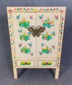 A Chinese hardwood hand decorated hall or linen cabinet. H.121 W.80 D.40cm
