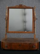 A 19th century mahogany and satinwood strung toilet mirror. H.63 W.53 D.25cm.
