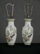 A pair of 19th century Japanese vases with birds amongst blossom, converted to table lamps. H.
