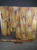 A set of three large floral decorated curtains, fully lined with curtain poles. H.245 W.360cm. (