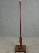 Standard lamp. early 20th century mahogany in the classical style. H.168cm.