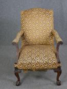 A Georgian mahogany Gainsborough chair on four carved cabriole supports in tapestry upholstery. H.99