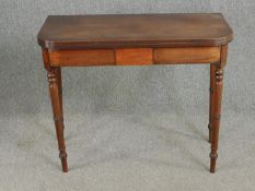 A Georgian mahogany console or tea table with fold over swivel top action. H.79 W.92 D.88cm.