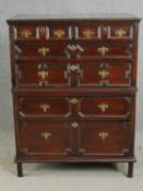 A Jacobean oak two section chest on chest. H.130 W.100 D.55cm.