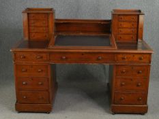 A Victorian mahogany Dickens desk with fitted interior. H.110 W.150 D.67cm.