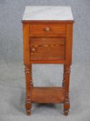 A French provincial pine marble topped pot cupboard. H.82 W.37 D.37cm.