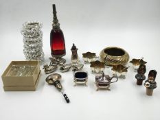 A miscellaneous collection of silver plated and crystal table items, salts, knife rests etc. H.