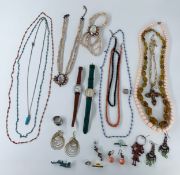 A collection of vintage dress jewellery to include two watches, Timex and a Soviet era example.