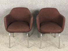 A pair of 1970's vintage office desk chairs with maker's label to the underside. H.75 W.60 D.65cm.