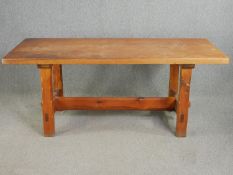 A pine refectory style dining table. H.76 W.183 D.75cm.