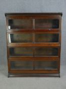A 19th century mahogany Globe Wernicke style four section bookcase. H.154 W.128 D.36cm.