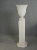 A Haddonstone cast stone urn on stand in the classical style. H.119cm.