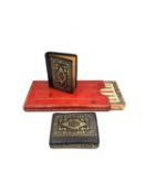 Two miniature books titled 'The Bijou History of England' Volumes one and two, and a Goldsmiths