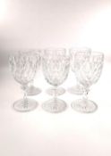 A set of six Baccarat crystal wine glasses. H.15cm