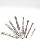 A collection of eight silver and other propelling pencils, one Sampson Mordan and co, some with semi