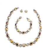A silver three piece set of earrings, a necklace and a bracelet, probably mid-century, with semi