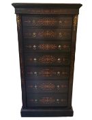 A 19th century ebonised Wellington chest, ormolu mounted with all over Arabesque satinwood inlay.