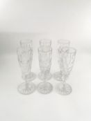 A set of six Baccarat crystal champagne flutes. H.18CM