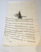 A hand written 18th century Ottoman firman in black ink bearing the mark/Tughra of the Sultan