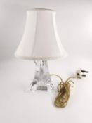 A Saint-Louis Crystal de France stylised crystal lamp with shade and maker's label. H.30cm