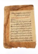 An early 15th century Persian manuscript, hand written in black and red ink to both sides. H.33 W.