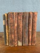 A collection of eight leather bound volumes to include State Trials, published 1805. H.47cm (each)