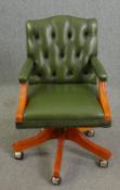 Captain's desk chair, leather upholstered with tilt and swivel action. H.87cm.