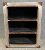 An Aviator open bookcase, leather, beech and metal bound. H.92 W.73 D.41cm