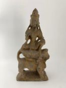 A carved Chinese stone figure group; Bodhisattva Wensu riding a temple lion. H.42cm