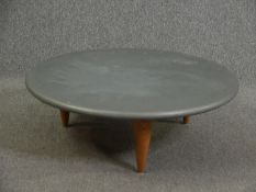 A Conran contemporary retro styled coffee table with a metal covered top. H.28 Dia.80cm.