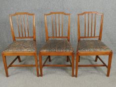 Three 19th century mahogany dining chairs.