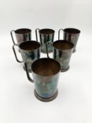 A set of six silver plated tankards. H.17cm (largest)