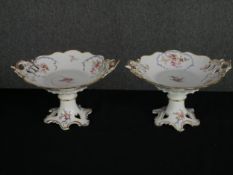 A pair of 19th century hand decorated comports. H.20 W.33 D.30cm.