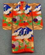A Japanese wedding kimono, silk and satin embroidered with chrysanthemums and cranes in flight. H.