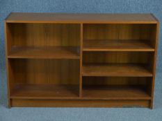 A vintage teak open bookcase. H.75 W.120 D.32cm.