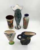 A collection of early to mid 20th century vases and a hand decorated water jug. H.39cm (largest)
