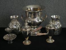 A collection of mixed silver plate, to include a campana form ice bucket, pair of basket form