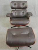 An Eames style armchair (model 670) and the matching ottoman (671) upholstered in leather. H.80cm (