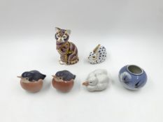 A collection of Royal Copenhagen and Royal Crown Derby animal figures along with a bowl. H.14cm (