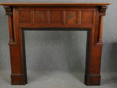 A mahogany fire surround of classical design. H.133 W.156 D.32cm.