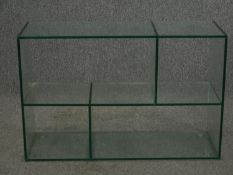 A contemporary plate glass open bookcase or display stand. H.56 W.85 D.30cm.