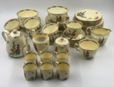 An early 20th century hand decorated Crown Staffordshire tea and coffee service.