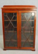 Bookcase, Edwardian mahogany and satinwood strung. H.128 W.92 D.27cm.
