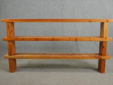 A contemporary floor standing set of pine open shelves. H.93 W.182 D.20cm.