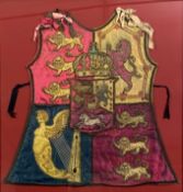 A herald of arms tabard with the Royal Arms of Hanover in silk damask with silk stump work and
