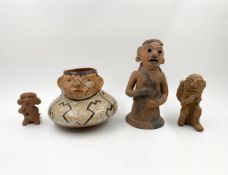 A collection of Pre Columbian style terracotta figures and a hand painted terracotta vase. H.22cm (