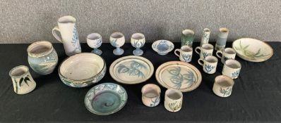 An extensive collection of mid century hand painted studio pottery to include Briglin etc. H.22cm (