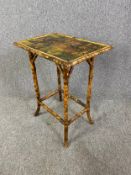 A 19th century bamboo occasional table with scrapwork top. tH.71 W.55 D.40cm